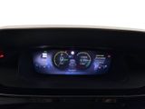 an image of a car dashboard with a digital display