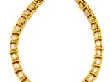 an image of a gold bracelet with white stones on it