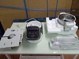 a blender sitting on a table with other items on it