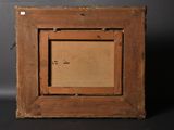an old wooden picture frame with a picture in it