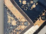 a close up of a rug on a table