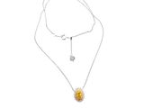 a necklace with a sunflower pendant on a chain