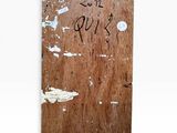 a picture of a piece of wood with writing on it
