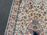 a person standing on a rug with their shoes on
