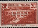 a stamp with a picture of a bridge on it