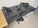 a table that has a bunch of different types of equipment on it