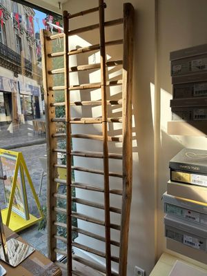 a ladder leaning up against a wall in a room