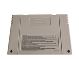 a nintendo game console sitting on top of a white table