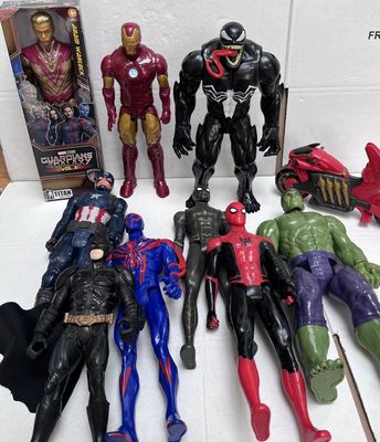 a lot of action figures that are on the table