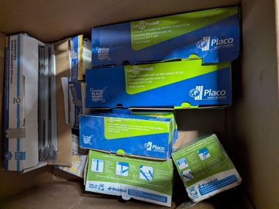 many boxes of blue and green items in a box