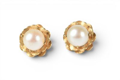 a pair of pearl and gold earrings on a white background