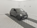 the small car is parked in the garage on the checkered floor