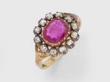 a ruby and diamond cluster ring