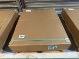 three cardboard boxes are stacked on top of each other on a pallet