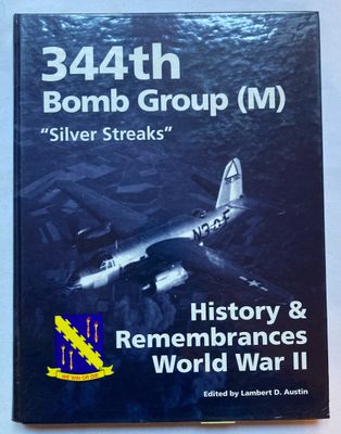un vieux livre sur lequel figure l'image d'un avion