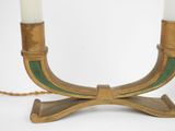 pair of art deco brass candlesticks with green and white candles
