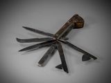 an old pair of scissors are laying on a white surface