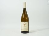 a bottle of wine that is sitting on a table