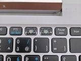 a close up of a laptop keyboard with a mouse on it