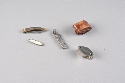 four different types of metal objects on a white surface