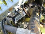 a close up view of a motorcycle engine and its hoses
