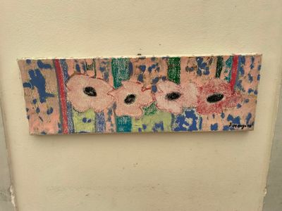 a picture of a painting on the wall of a bathroom