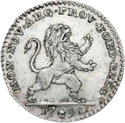 an old silver coin with a lion on it