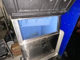 an image of a metal oven with a blue door