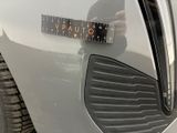 a close up of a sticker on the side of a car