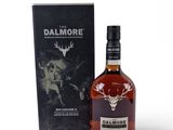 a bottle of dalmore single malt whisky next to a box