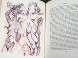 a book with a drawing of a group of people on it