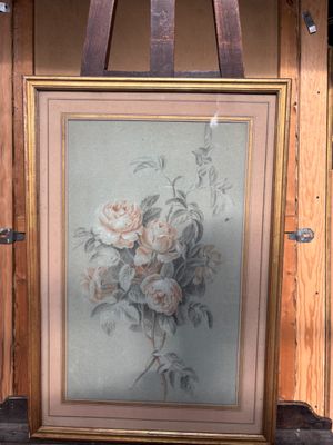 une image d'un tableau sur un chevalet dans une pièce