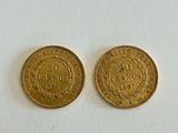 two gold coins, one of which has a crown and the other of which has a crown on it