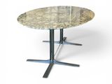 a table with a marble top and metal legs on a white background