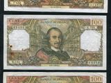 trois billets de banque différents, dont l'un porte l'effigie d'un homme