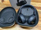 an image of a pair of headphones in a case on a table