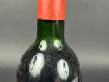 a bottle of wine that is sitting on a table