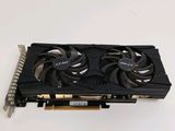 a close up of a video card with a fan on top of it