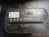 a toaster that is sitting on a tiled floor