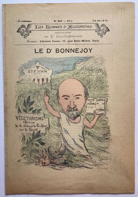 un vieux livre sur lequel figure le dessin d'un homme en chemise blanche