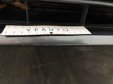 a close up of a sticker on the bumper of a car