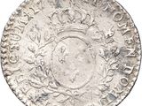 an old silver coin with a crown on top of it