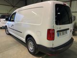 a white van that is parked in a garage