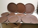 many plates and pans sitting on a white table