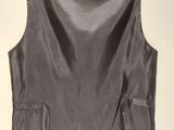this image may contain clothing, clothing, or clothing, but it ' s also a vest