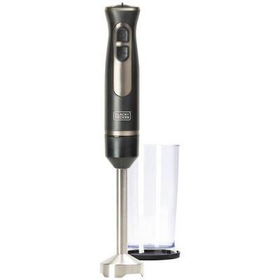 an electric blender with a glass in front of it on a white surface