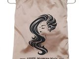 a drawsack bag with a woman ' s face on it