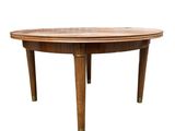 a round wooden table with a wooden top on a white background