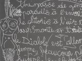 a blackboard with writing on it that has writing on it