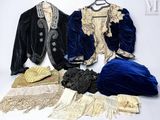 many different types of clothing on display on a table